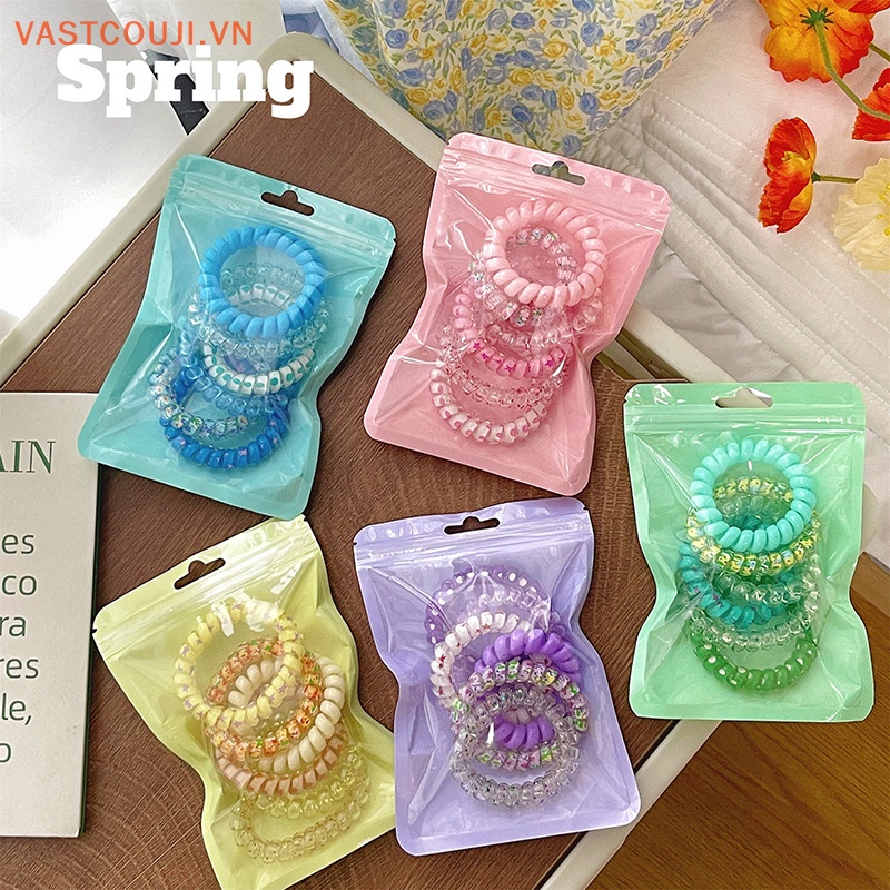 Set 6 Dây Buộc Tóc Dạng Xoắn Co Giãn Màu Kẹo Ngọt Thiết Kế Đơn Giản