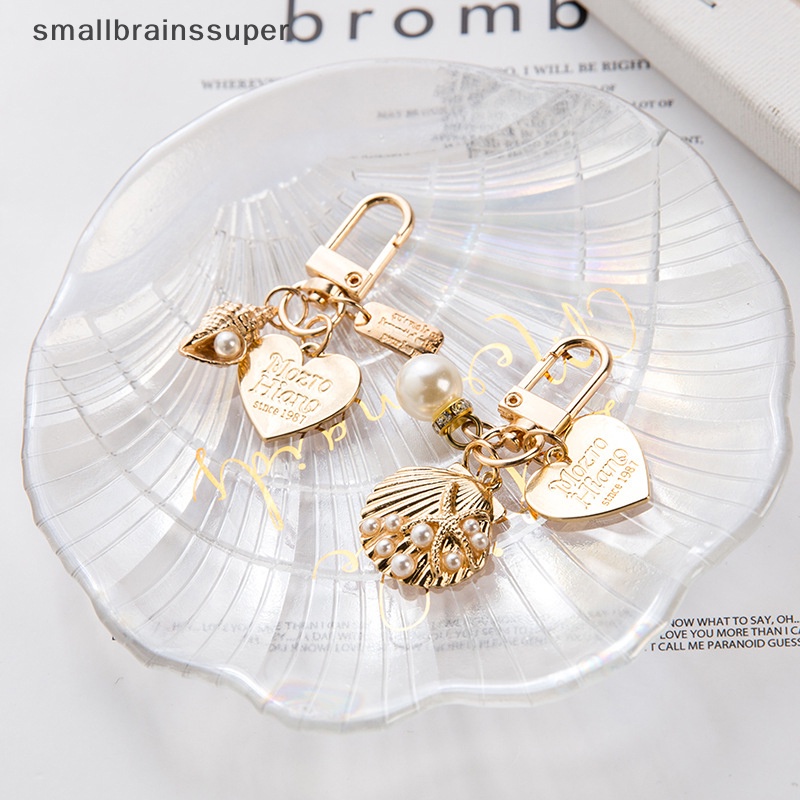 Móc Khóa Hình Vỏ Sò Đính Ngọc Trai Thời Trang Dành Cho Nữ SBS