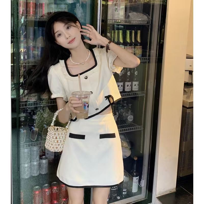 Set Áo Lửng Phối Chân Váy Ngắn Phong Cách Retro Thời Trang Hè Mới Cá Tính Cho Nữ