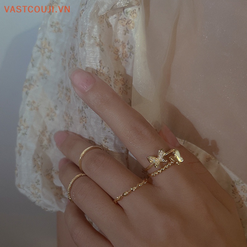 Bộ 4 Nhẫn Hình Tròn Họa Tiết Bướm Màu Bạc Tùy Chỉnh Thời Trang Cho Nữ
