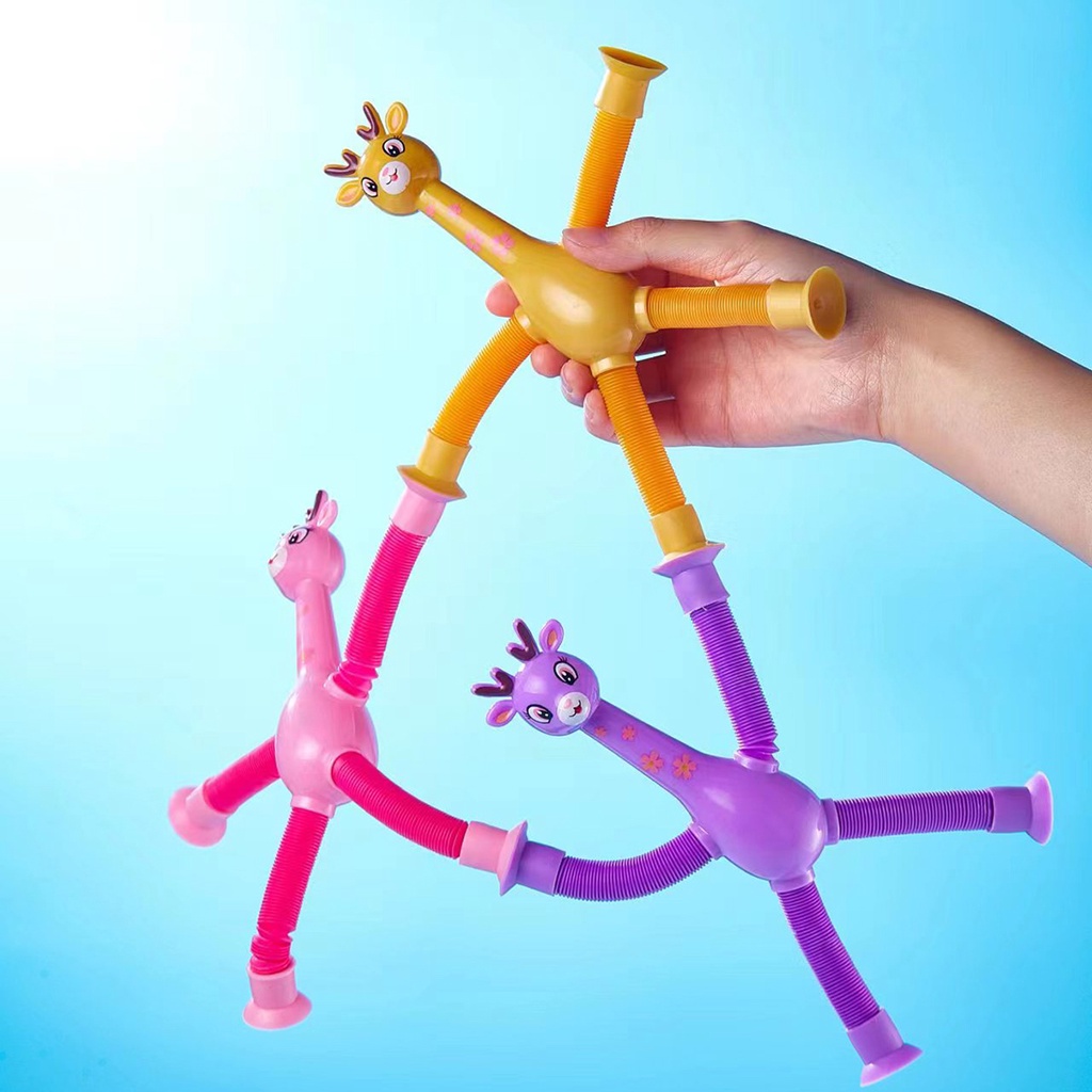 Đồ chơi Lò xo hươu cao cổ có ống hút dính . hươu lò xo kéo dãn đèn sáng