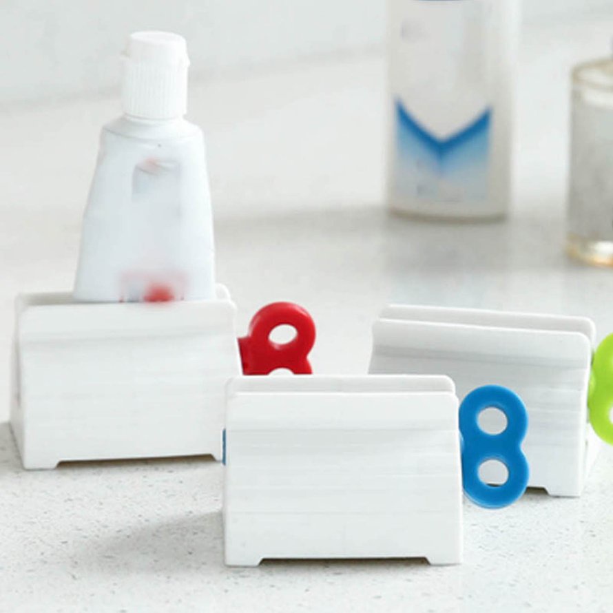 Rolling Tube Toothpaste Squeezers Dispenser Seat Holder Stand Bathroom Product