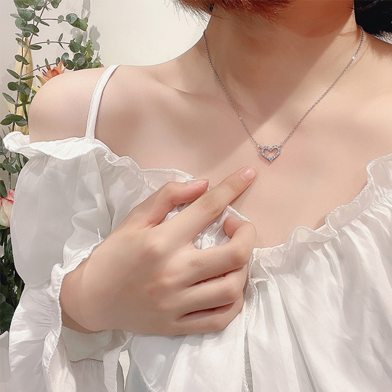 Vòng cổ DODDER mặt trái tim rỗng đính đá pha lê thời trang cho nữ