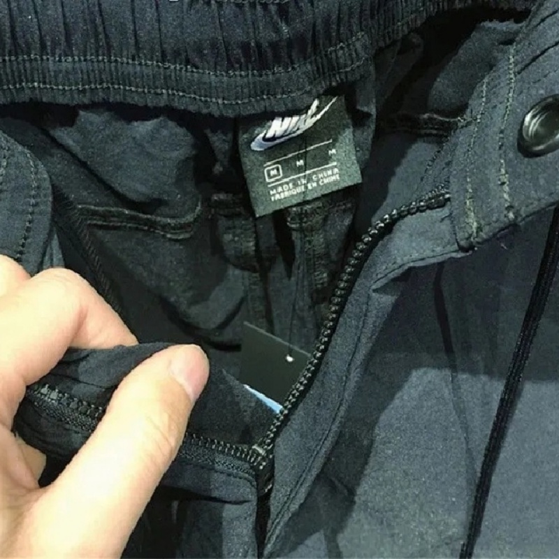 Quần chạy bộ Nike 100% Chính Hãng Dáng Rộng Phối Túi Có Khóa Kéo Thời Trang Dành Cho Nam Giới