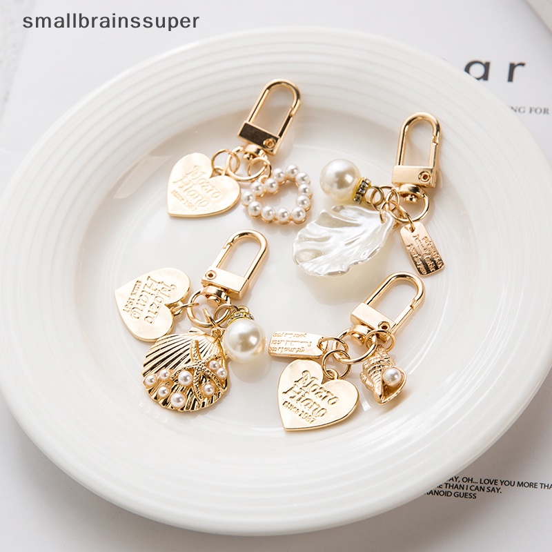 Móc Khóa Hình Vỏ Sò Đính Ngọc Trai Thời Trang Dành Cho Nữ SBS