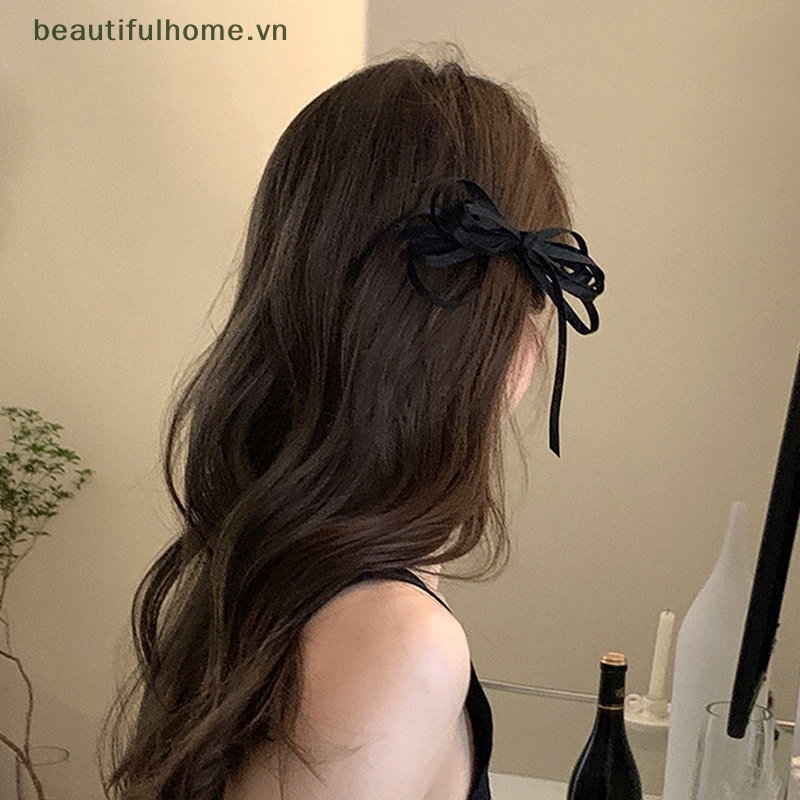1 Kẹp Tóc Hình Nơ Ruy Băng Màu Đen Xinh Xắn Cho Nữ