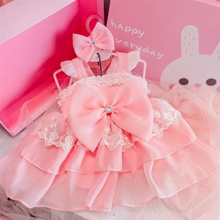 Đầm hồng cam 3 tầng nơ 2 dây cho bé gái