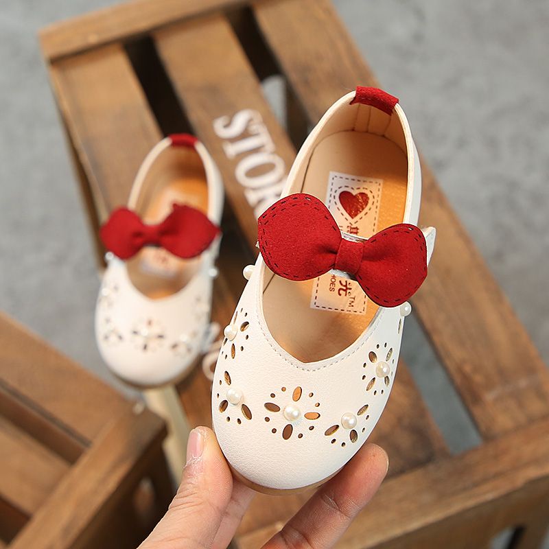 Giày trẻ em cô gái giày công chúa Baby Baby Toddler Shoes Soft Sole Anti-slip giày da nhỏ phong cách mùa xuân mùa thu rỗng thời trang ngọt ngào giày nơ hợp thời trang đen trắng hồng