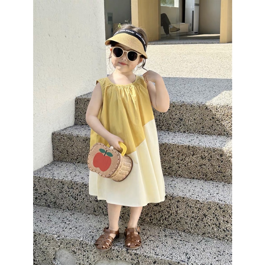 Váy xuông vàng phối kem bé gái
