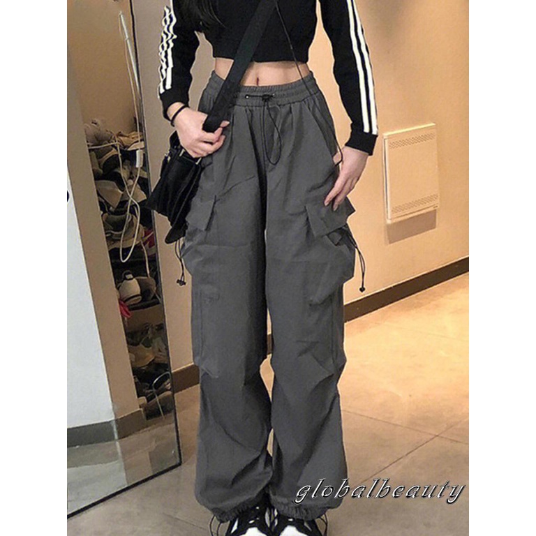 Quần Dài Dáng Rộng Màu Trơn Lưng Thun Phối Túi Thời Trang Đường Phố Cho Nữ