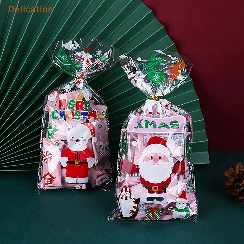 Bộ 50 túi gói kẹo/ bánh quy ELEBUY bằng nhựa trong suốt có dây buộc ruy băng làm quà tặng Giáng sinh
