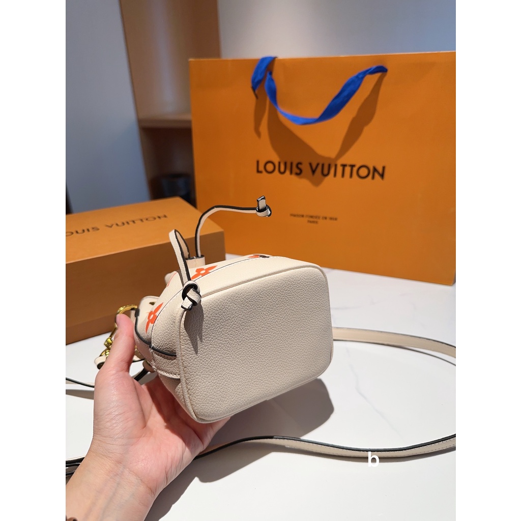 L nano noe túi messenger có dây rút mini dành cho nữ