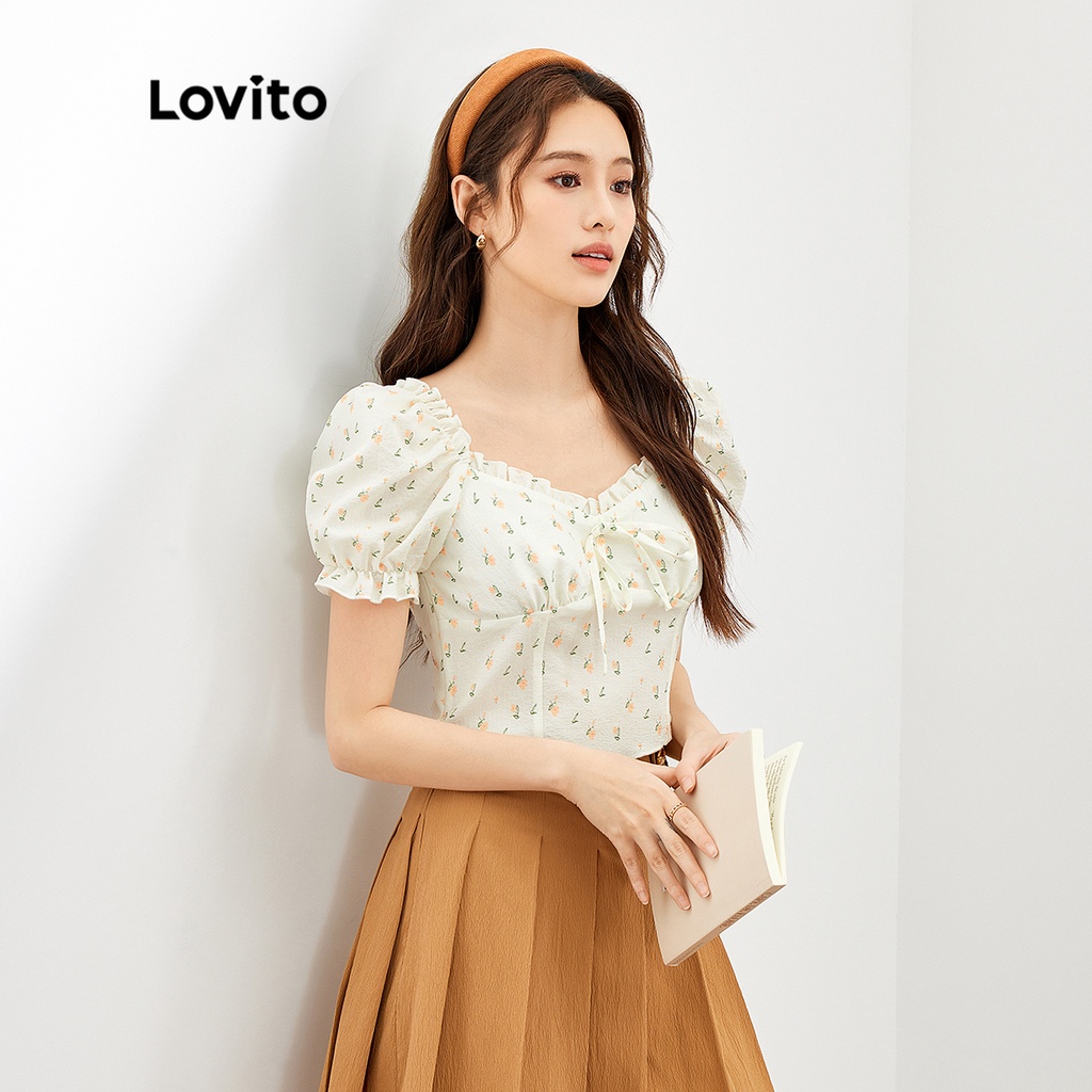 Áo Lovito cổ vuông khóa kéo một bên diềm xếp nếp trước thắt nơ họa tiết hoa cơ bản cho nữ L47ED121 (màu vàng nhạt)