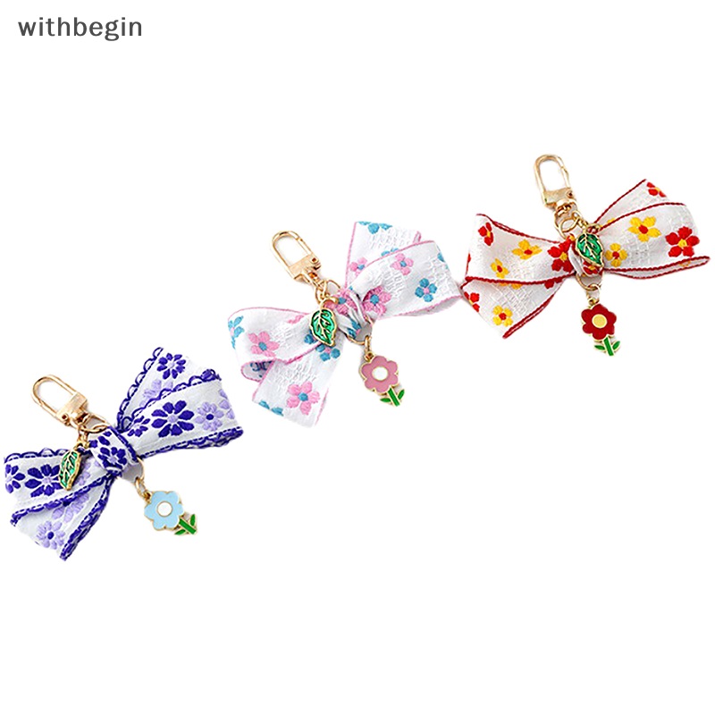 1 Móc Khóa Hình Hoa Hướng Dương Thắt Nơ Ruy Băng Nhỏ Xinh