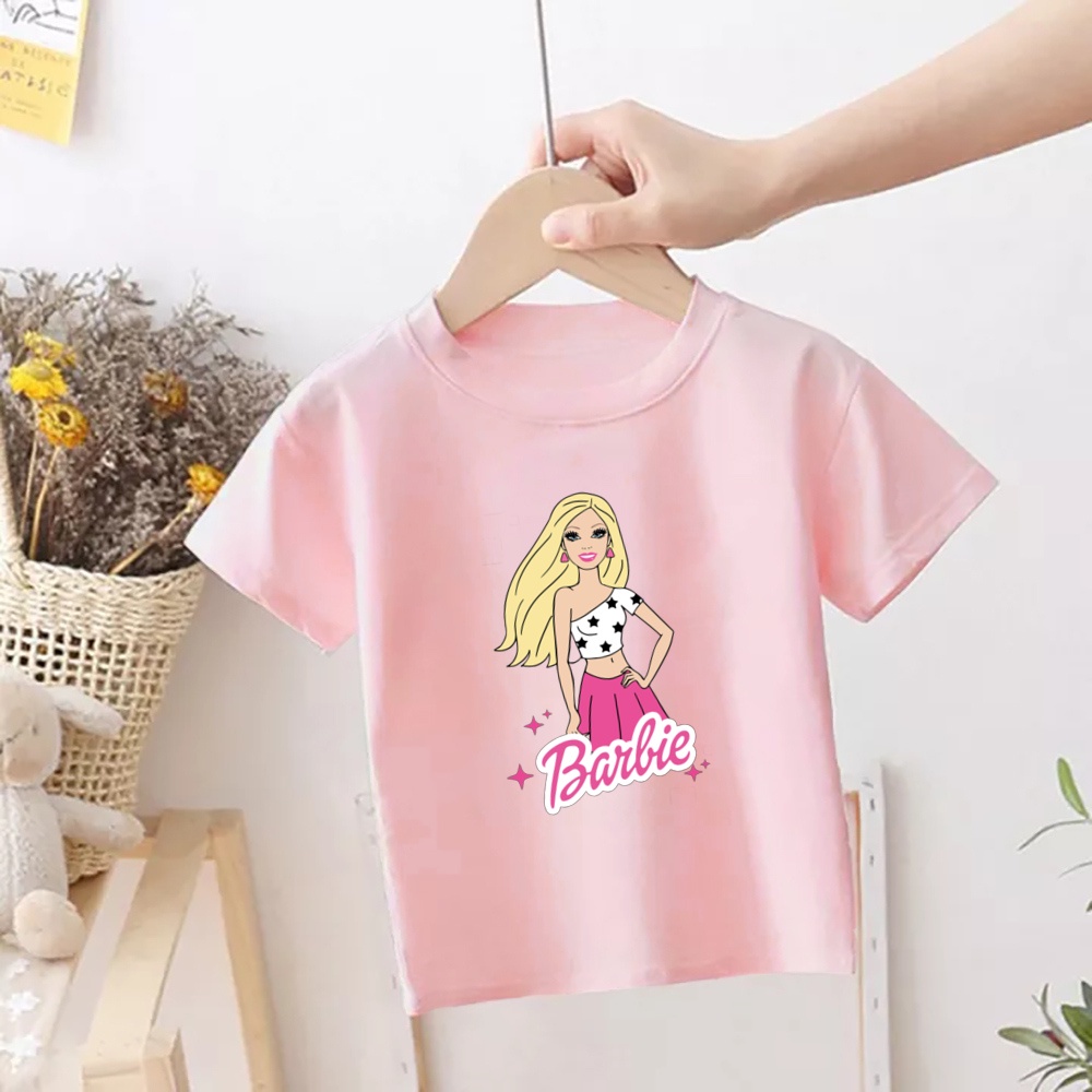 Áo Thun Tay Ngắn In Hình Búp Bê barbie Màu Hồng Thời Trang Cho Bé Gái Từ 1-12 Tuổi