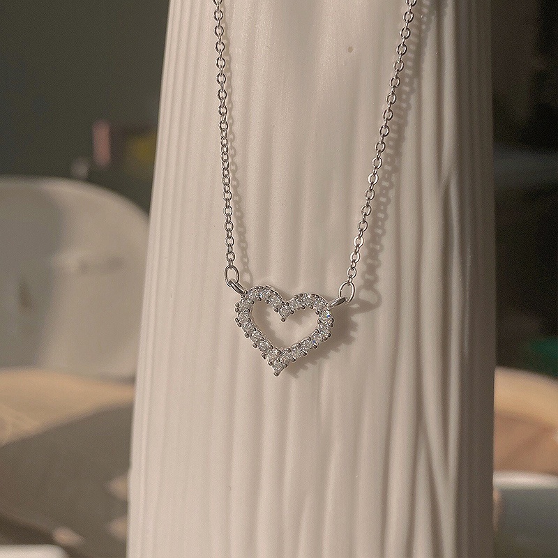 Vòng cổ DODDER mặt trái tim rỗng đính đá pha lê thời trang cho nữ