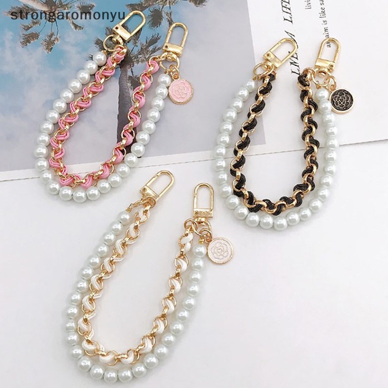 Dây Đeo Tay Bằng Da Đính Ngọc Trai Chống Thất Lạc Cho Điện Thoại