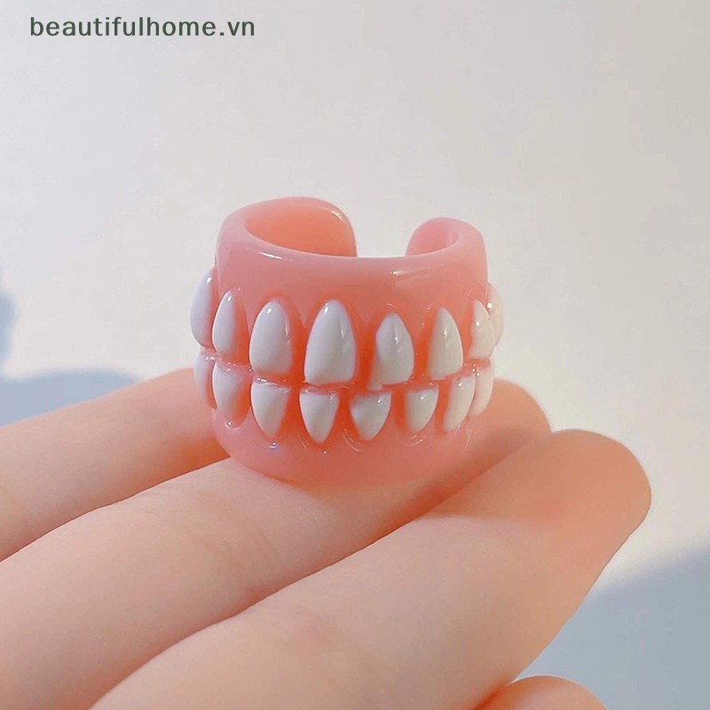Nhẫn Nhựa Hình Chiếc Răng Sáng Tạo Vui Nhộn Thời Trang Hàn Quốc Cho Nam Nữ