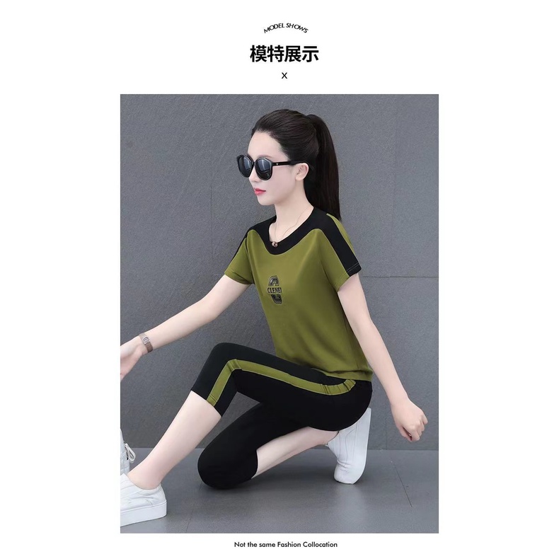 Bộ Đồ Thể Thao Hai Mảnh Áo Tay Ngắn Cổ Tròn Và Quần Ngắn Ôm Dáng Phong Cách Thời Trang Phương Tây Mẫu Mới 2023 ylk