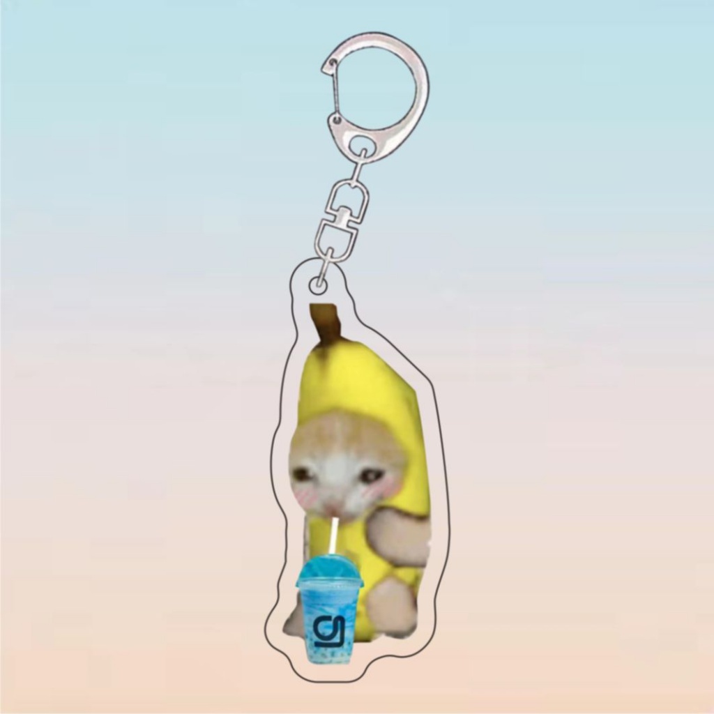 Móc Khóa 4cm Hình Chú Mèo Đeo Sách Ăn Thịt Chuối Ngộ Nghĩnh Đáng Yêu Năm 199 NLPSHOP