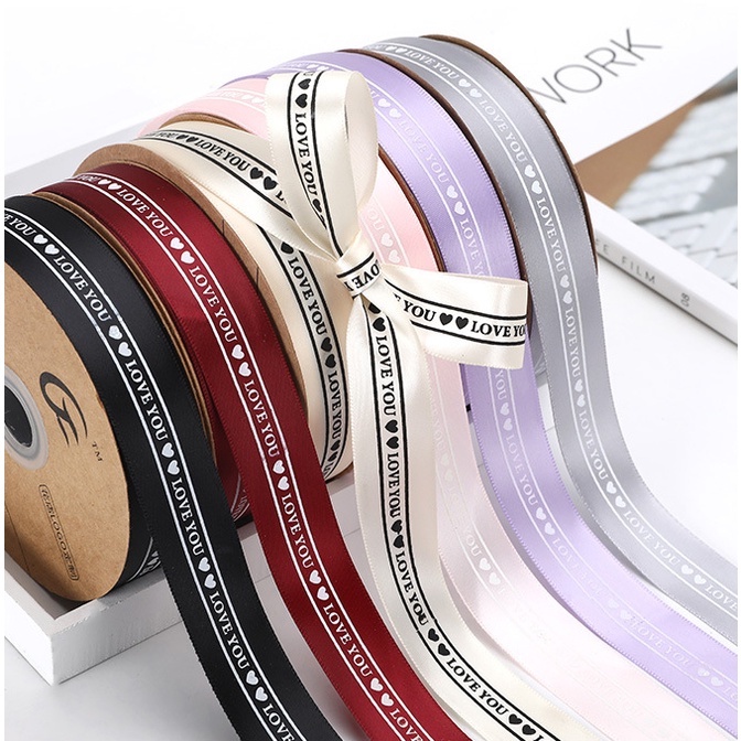 Ruy băng lụa gói quà và hoa in chữ bản 2,5cm dài 35m