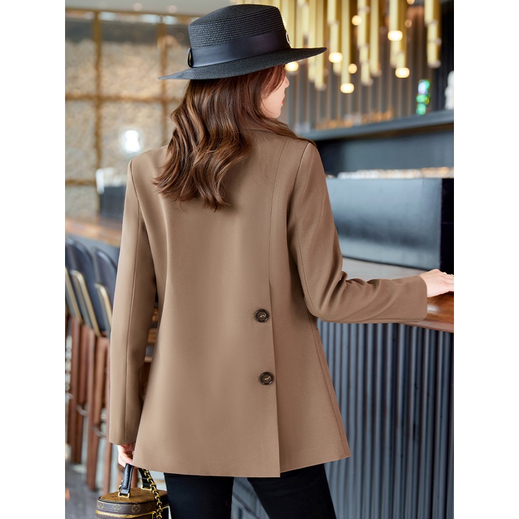 Áo Khoác Vest màu đen cho nữ mùa xuân thu năm 2023 phong cách thời trang tạo cảm giác cao cấp và thiết kế độc đáo với nút kép là một chiếc áo vest thời trang và ôm sát