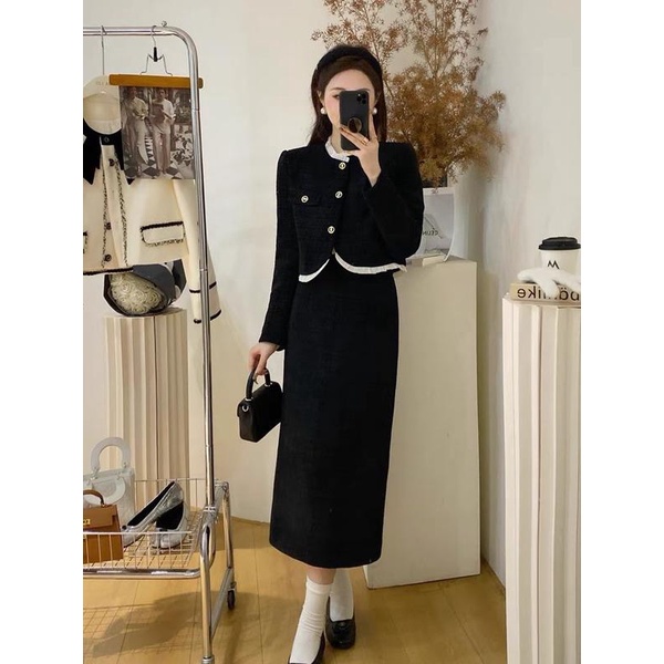 Váy set đen: áo cổ tàu bèo trắng tay dài, chân váy a dài cùng set