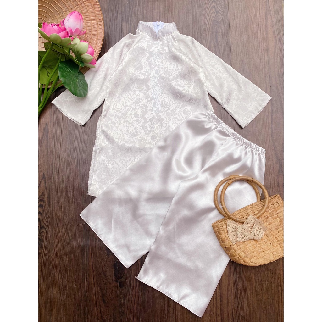 Bộ đồ áo dài trắng tay dài vải lụa gấm cho em bé gái size 9-27kg