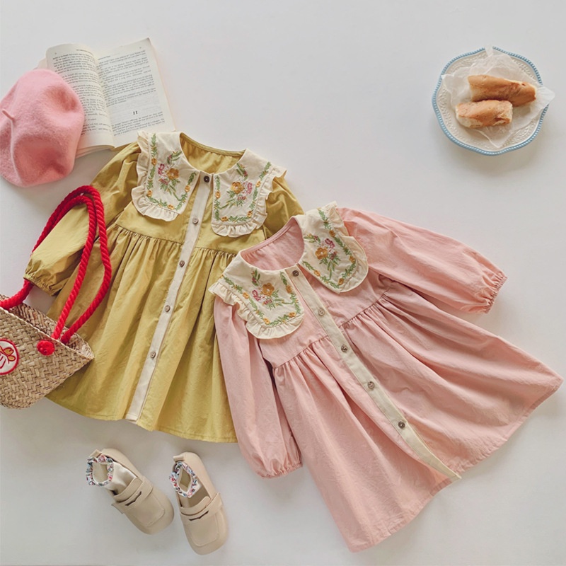 Cô gái váy trẻ em dài tay váy cổ tròn váy dệt kim áo chui đầu cho bé váy mùa thu trẻ em mặc