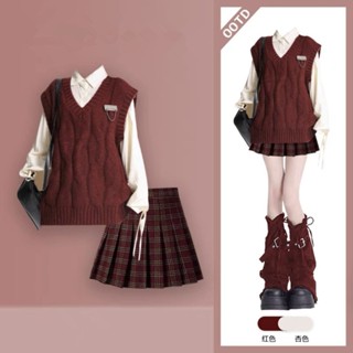Áo ghi lê dệt kim màu đỏ phong cách đại học mùa thu và mùa đông áo sơ mi dây rút váy xếp ly kẻ sọc bộ ba mảnh