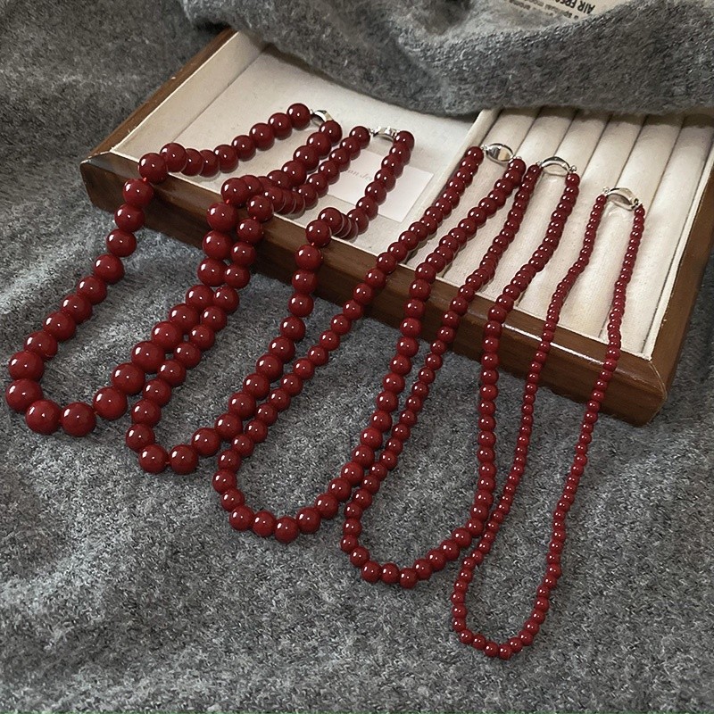 Vòng cổ ngọc trai đỏ cổ điển thời trang khí chất thủy tinh đính cườm vòng cổ đơn giản niche trang sức cao cấp bán buôn cho nữ