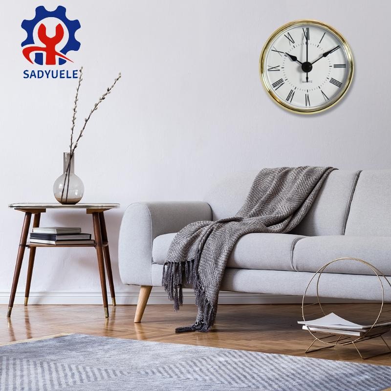 Đồng hồ thạch anh tròn treo tường SADYUELE Mặt số trắng Viền vàng Mã số chạy bằng số La Mã