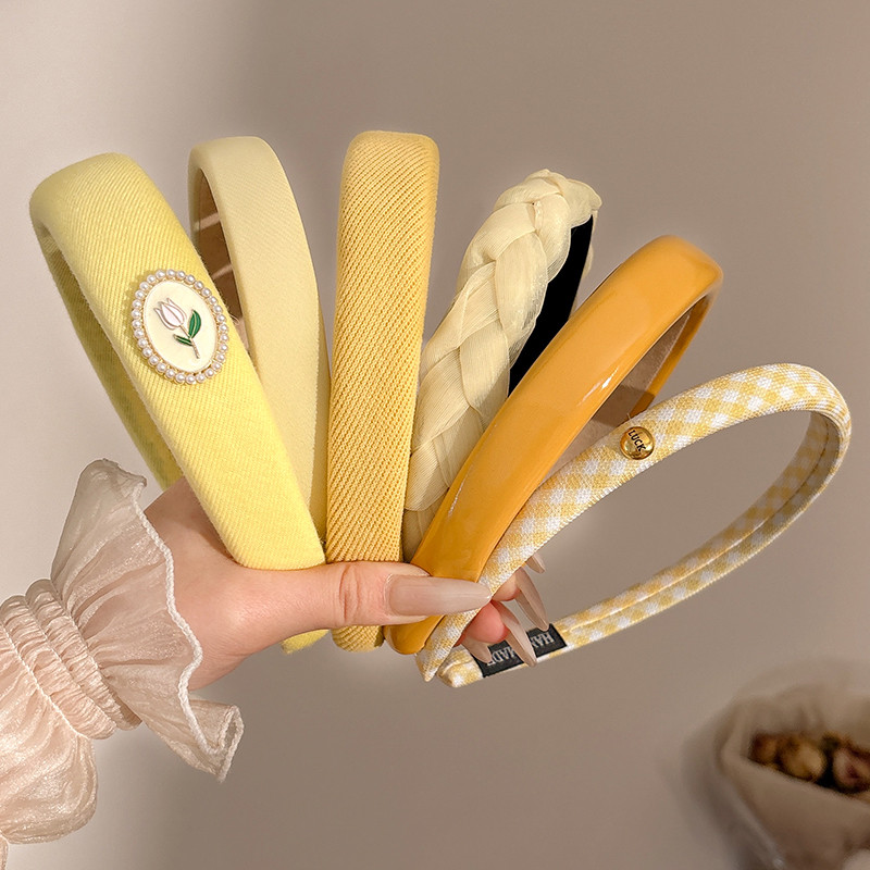 Băng đô màu vàng dành cho phụ nữ Băng đô rửa mặt lưỡi rộng cao cấp mới Băng đô đầu lâu hàng đầu