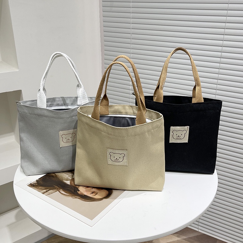 Đơn giản thiết kế túi xách nữ 2023 mới túi vải bình thường xu hướng thời trang xách tay túi xách