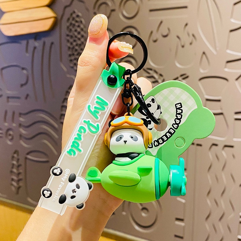 Móc Khóa Hình Gấu Trúc / Phi Công Xoay Được