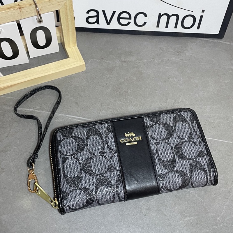Ví Da Cầm Tay Màu Đen Cho Nam Và Nữ coach4140 k