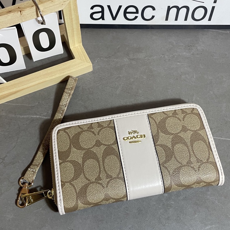 Ví Da Cầm Tay Màu Đen Cho Nam Và Nữ coach4140 k