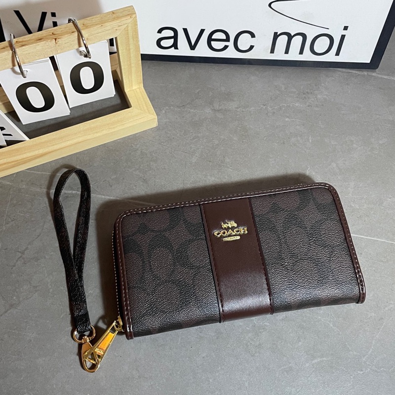 Ví Da Cầm Tay Màu Đen Cho Nam Và Nữ coach4140 k