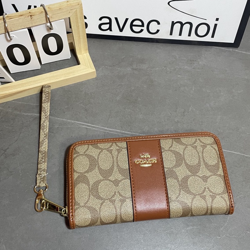 Ví Da Cầm Tay Màu Đen Cho Nam Và Nữ coach4140 k