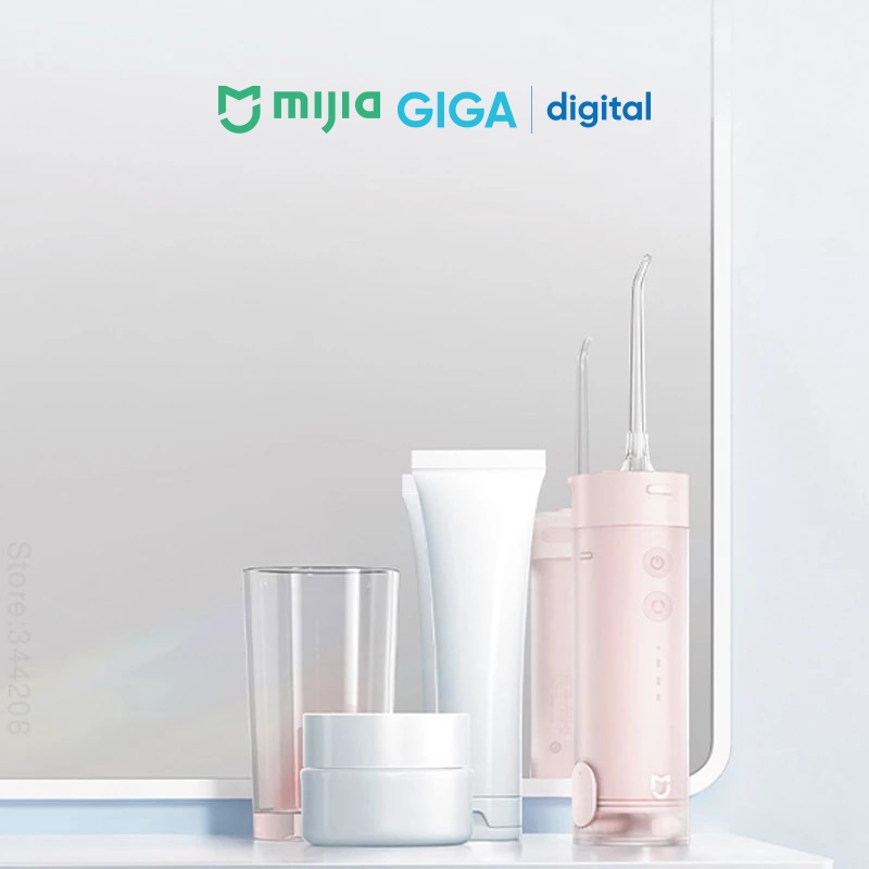 Tăm nước vệ sinh răng miệng Mijia MEO701 - MEO702 kèm 4 đầu xịt - Tăm nước Mijia cao cấp