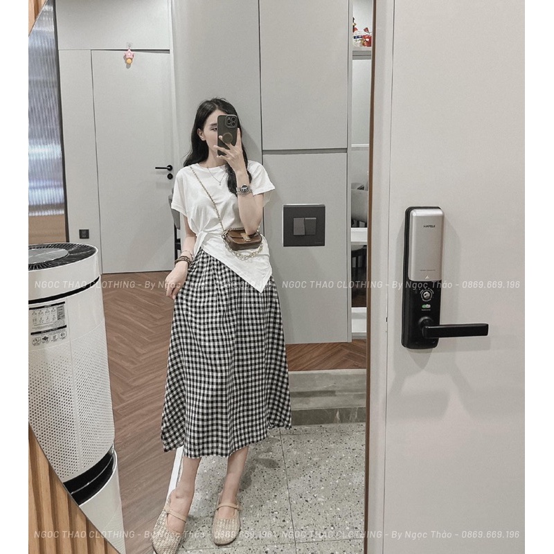 Set áo trắng rúm vạt lệch mix chân váy caro đen chuẩn video ảnh thật trải sàn