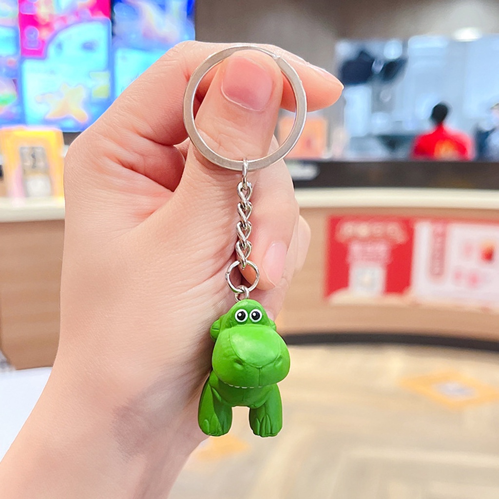 Câu chuyện đồ chơi mới buzz lightyear strawberry bear three-eyed boy bag phụ kiện phim hoạt hình xe hơi móc khóa