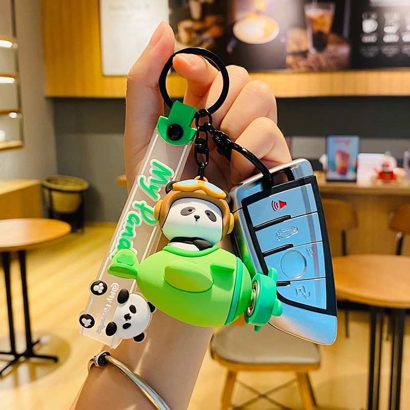 Móc Khóa Hình Gấu Trúc / Phi Công Xoay Được