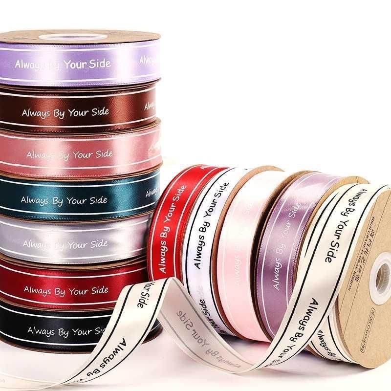 Ruy băng lụa gói quà và hoa in chữ bản 2,5cm dài 35m