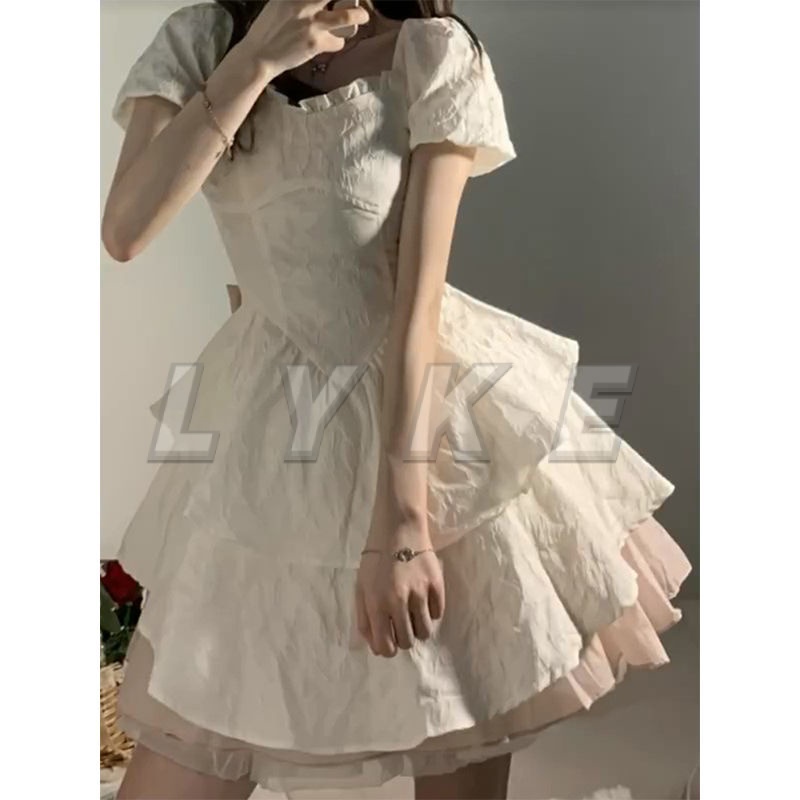 Váy babydoll váy trắng dự tiệc Váy Liền Bồng Công Chúa Nơ Tay Phồng Kiểu Pháp