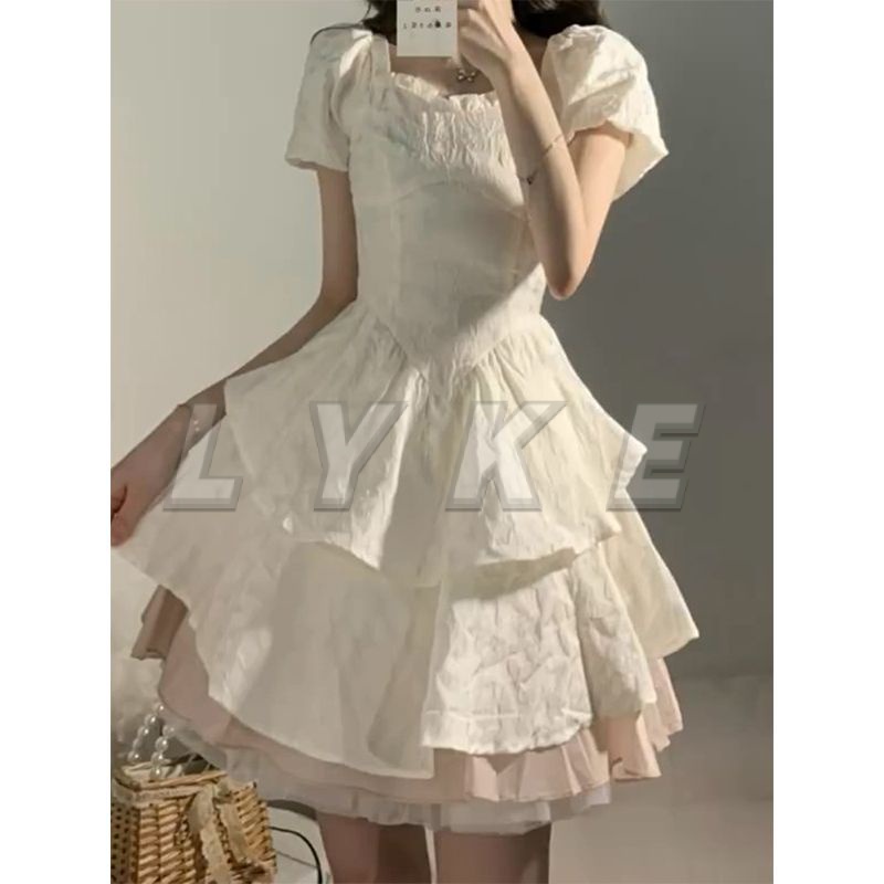 Váy babydoll váy trắng dự tiệc Váy Liền Bồng Công Chúa Nơ Tay Phồng Kiểu Pháp