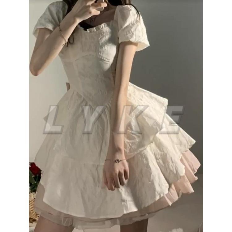 Váy babydoll váy trắng dự tiệc Váy Liền Bồng Công Chúa Nơ Tay Phồng Kiểu Pháp