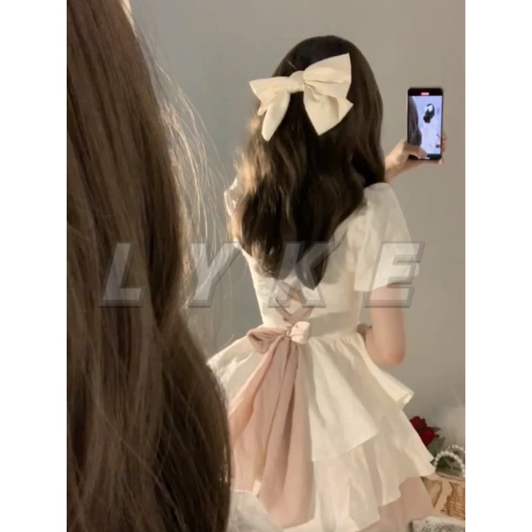 Váy babydoll váy trắng dự tiệc Váy Liền Bồng Công Chúa Nơ Tay Phồng Kiểu Pháp