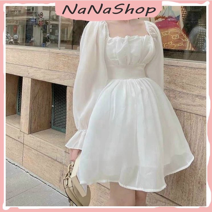 Đầm voan trắng tay dài bồng cổ vuông cột nơ sau váy hở lưng