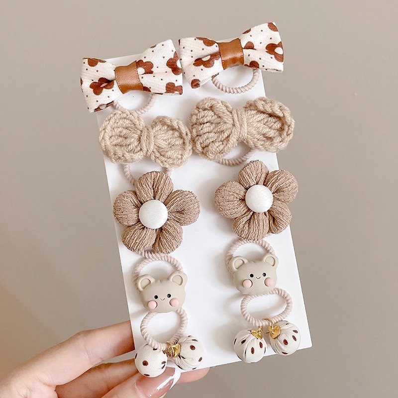 Dây Buộc Tóc Cao Su Màu Cà Phê Đính Nơ Hoa Xinh Xắn Cho Bé Gái